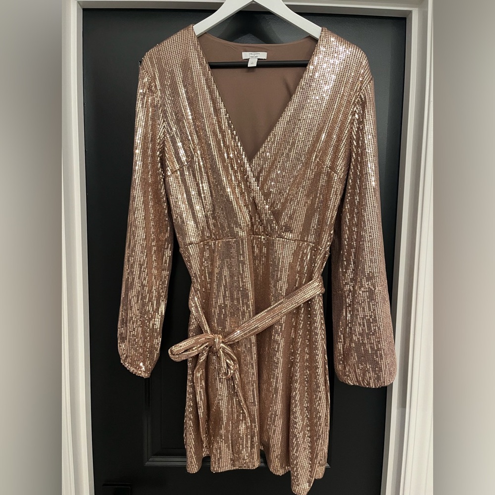 Cara Santana x North West gold sequin dress